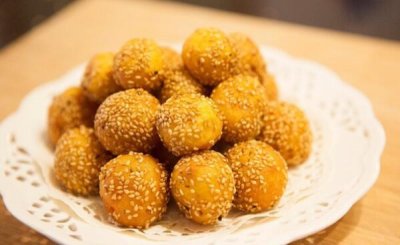 ​怎样处理麻球没有瘪，油温三成热（炸时用漏勺悄悄按）