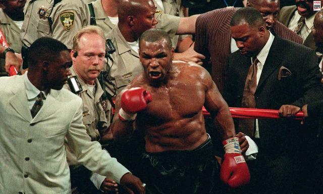 拳王泰森和刘易斯到底谁更强?看看他们的这位对手给出的答案!