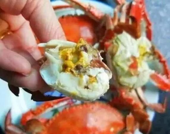 冻螃蟹没热透能吃么