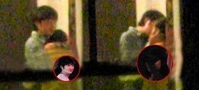 王大治和董洁三亚照片(身材娇小的董洁被王大治抱头亲吻)